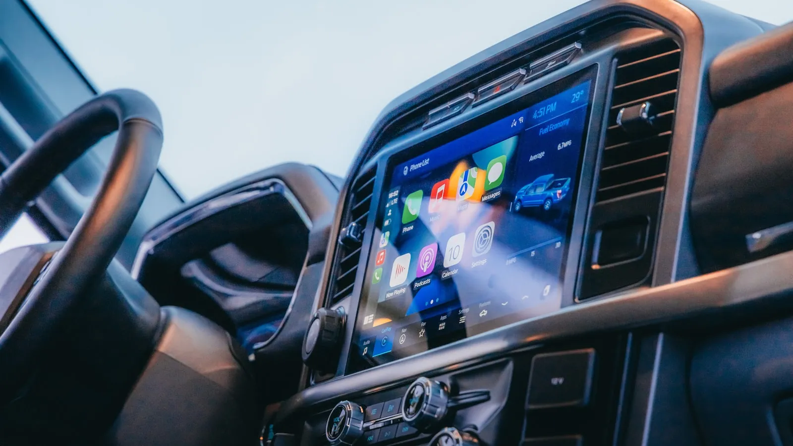 Modern car dashboard with a touchscreen infotainment display